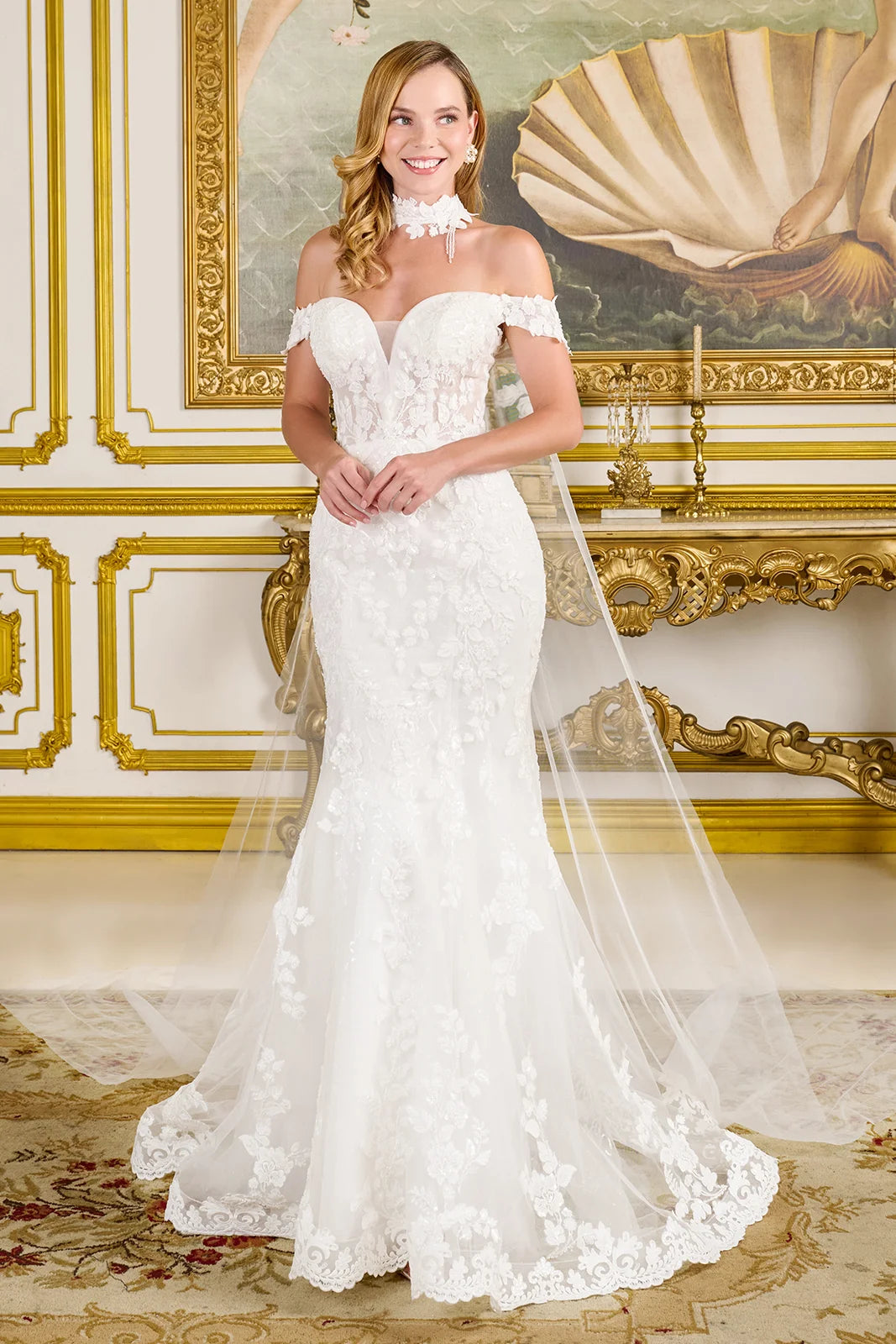 Off-shoulder straps frame a flattering V-neckline