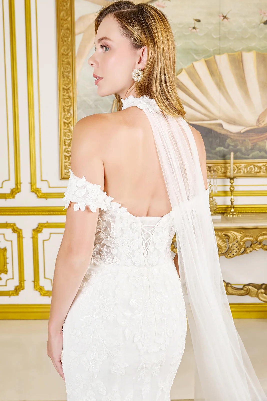 Off-shoulder straps frame a flattering V-neckline