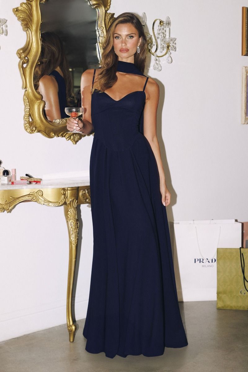 A-line gown features a strapless lace-up corset back