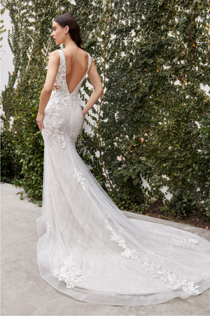 mermaid silhouette is form-flattering with a sophisticated lace-edge V-neckline